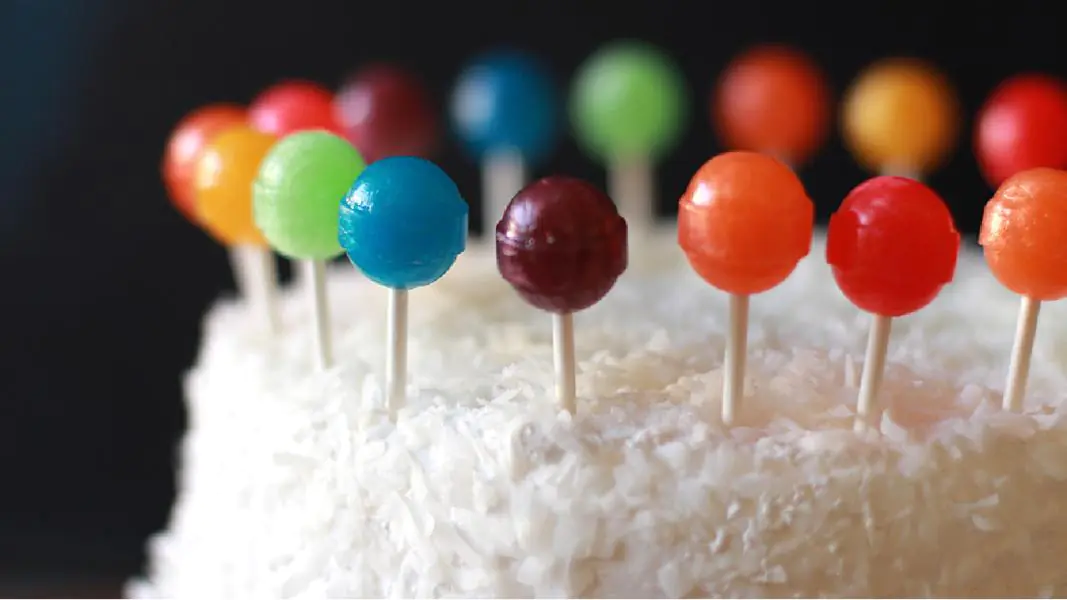 Happy Birthday Cake with Lollipops and Donuts Stock Photo - Image of  holiday, colored: 176246608